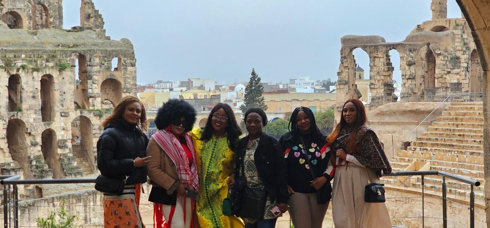 Group of six women visiting the El Jem amphitheatre in Tunisia